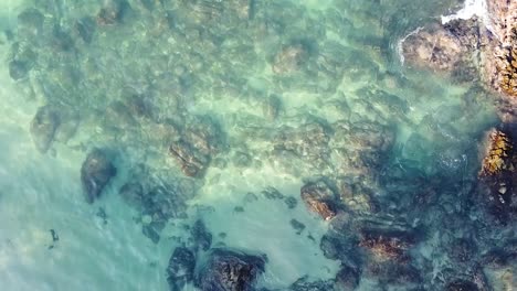 drones dispararon olas en la playa