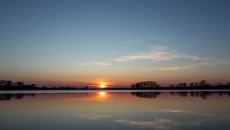 Sunset-Timelapse-Over-a-Glassy-Calm-Lake