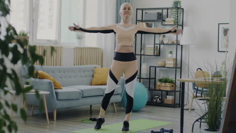 elderly woman doing a home workout