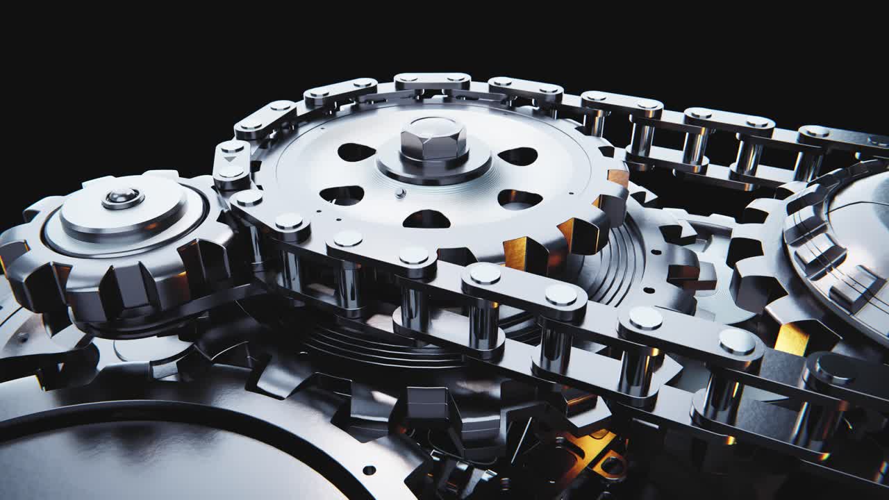Close-up of Rotating Metal Gears and Chain Mechanism
