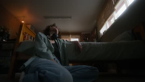 woman relaxing in her bedroom