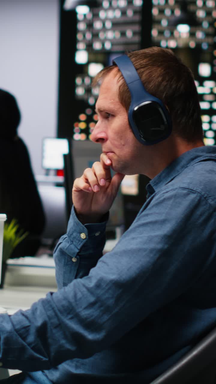 Vertical Video Male graphic designer using AI powered content for image retouching