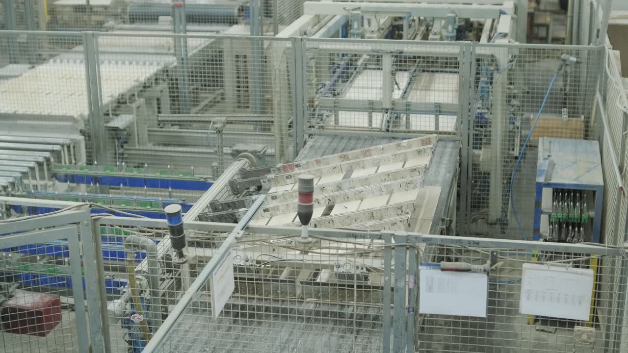 Automated Industrial Machinery Moving Panels on a Production Line