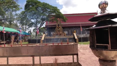 Incense-offering-in-front-of-a-modern-Temple-at-the-Temple-of-Wat-Bang-Kung-in-Thailand