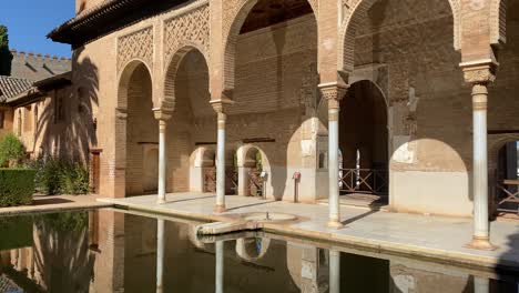 slow tilt yp of the partal palace in the nasrid gardens of the alhambra