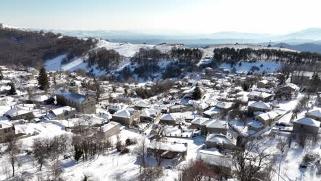 aerial view of nymfaio snow-capped, winter tranquil landscape in north greece