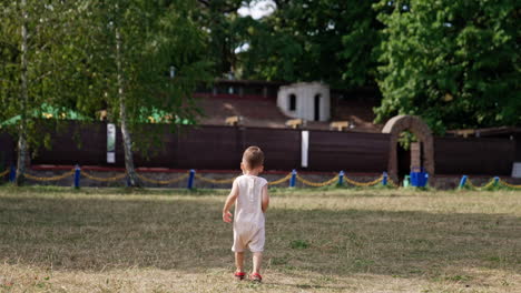 child walking in a park