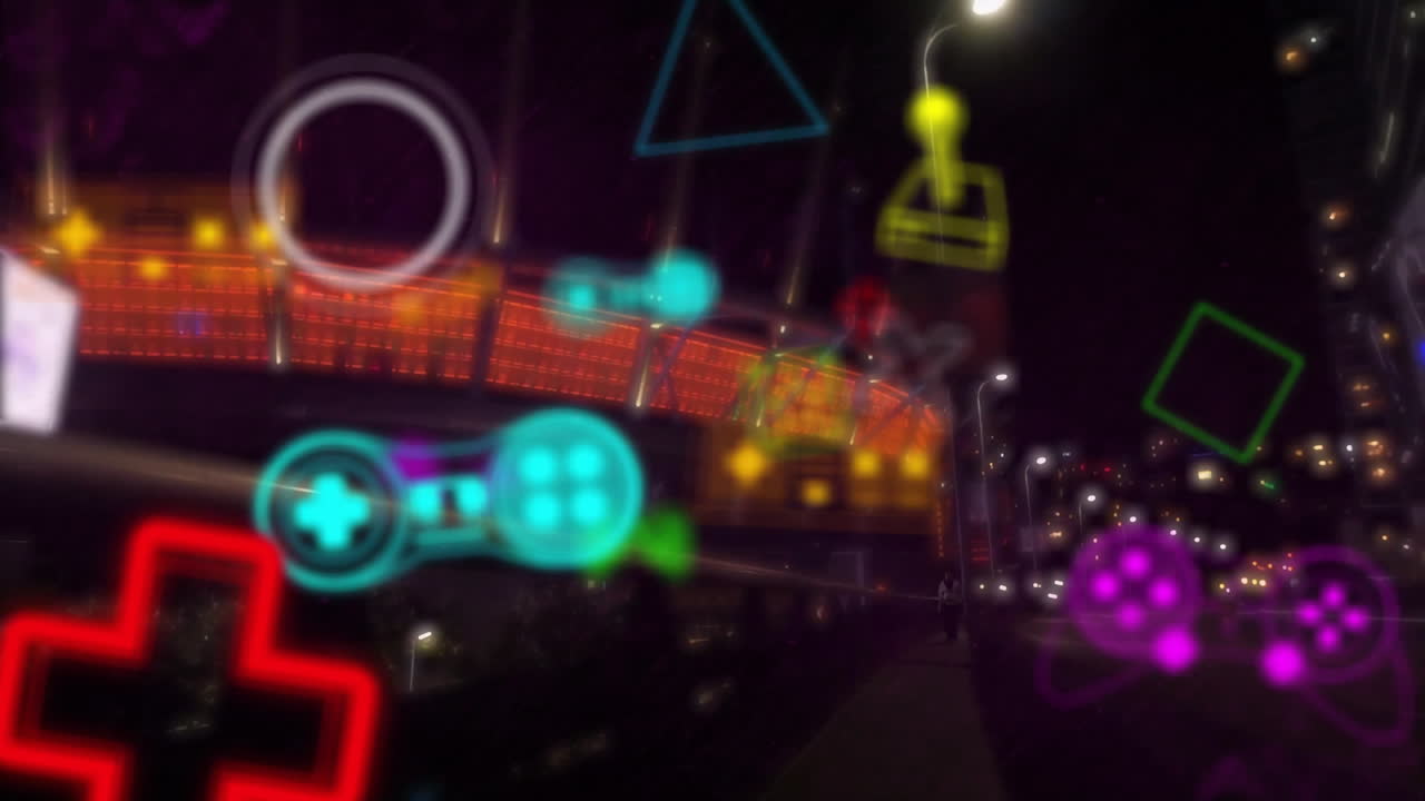 Animating neon gaming icons over city street at night