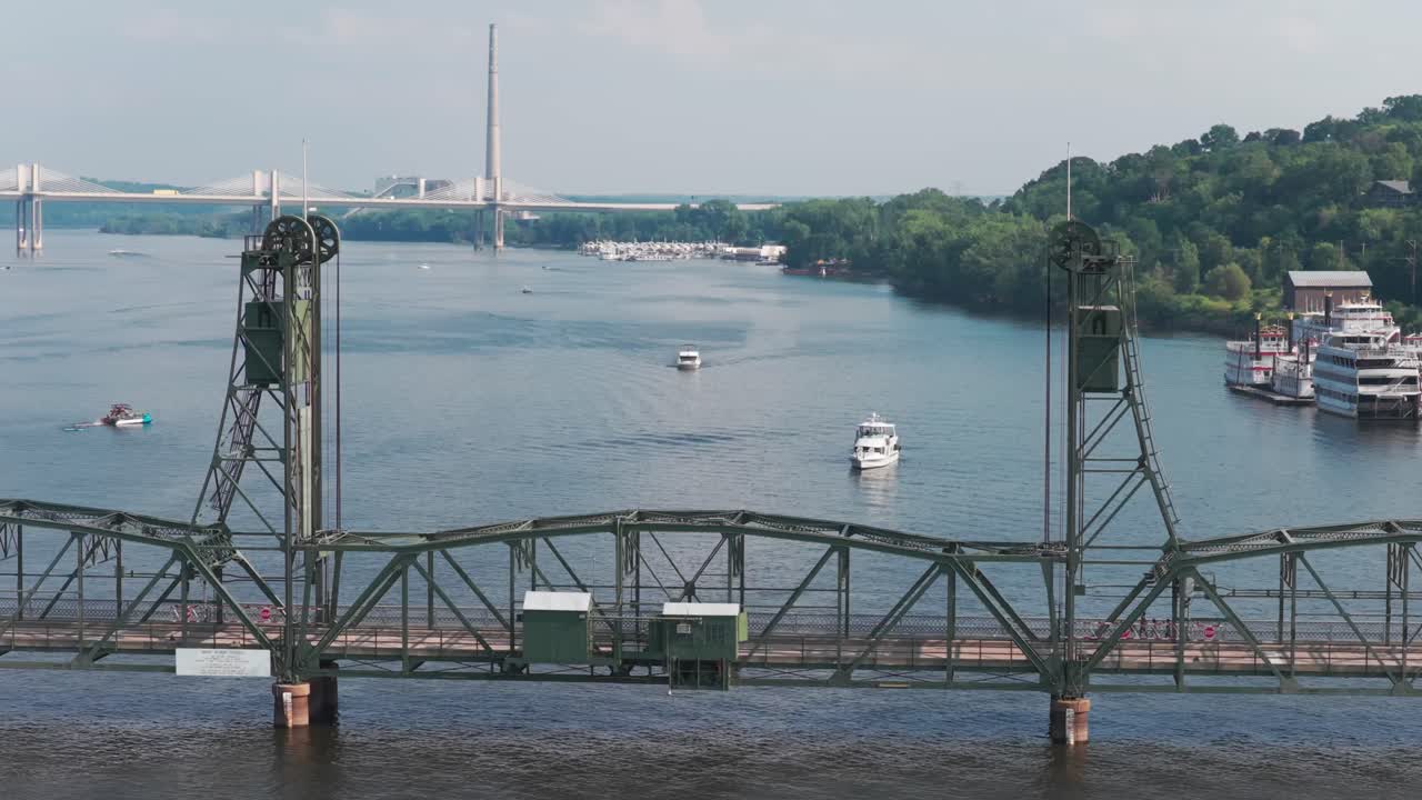 Telephoto aerial close-up panning shot of the Stillwater Life Bridge on the St. Croix River in Stillwater, Minnesota. 4K