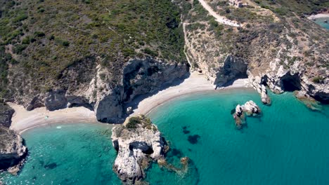 aerial tilted view over kaladi beach with crystal clear waters in kythira island, greece