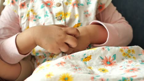 baby girl in a floral dress