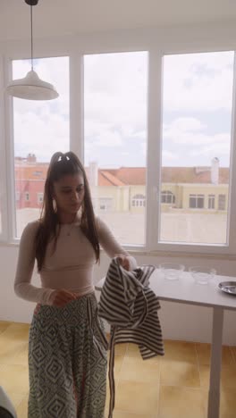 woman preparing to cook in modern kitchen
