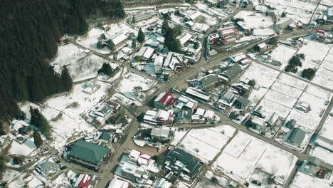 Bird's-Eye-View-Of-The-Townscape-In-Okuhida-Region-Beside-The-Lush-Green-Forest-In-Gifu,-Japan