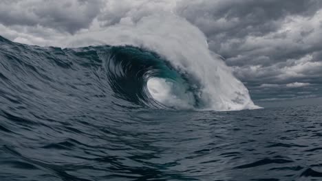 dramatic ocean wave captured from a low-angle perspective, emphasizing its power and scale