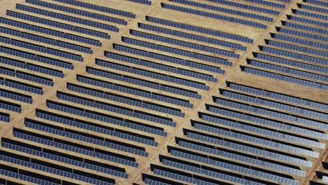 top down aerial view of big solar panels array, solar park power station, green energy concept, high angle drone shot