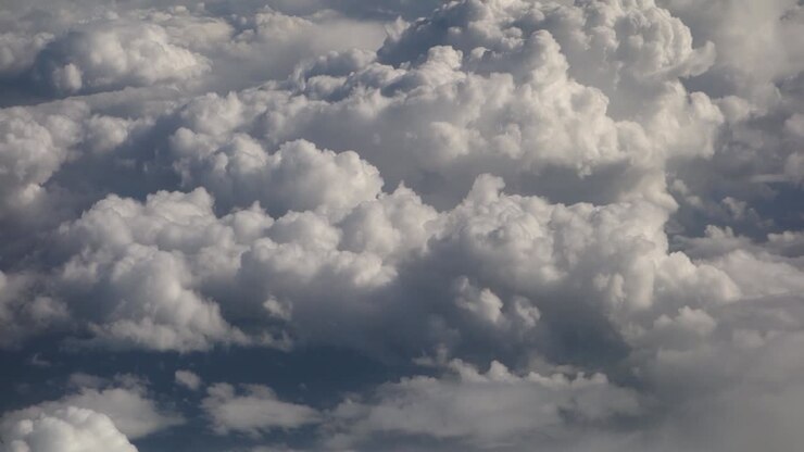 Flying through clouds in the sky
