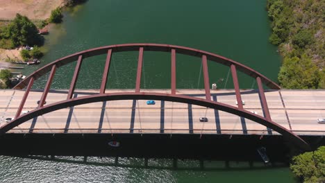 pan left drone shot of the pennybacker bridge in austin, texas