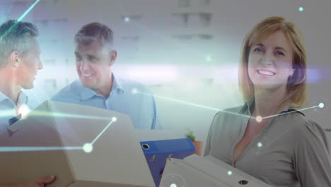 Glowing-network-of-connections-against-businesswoman-holding-file-documents-smiling-at-office