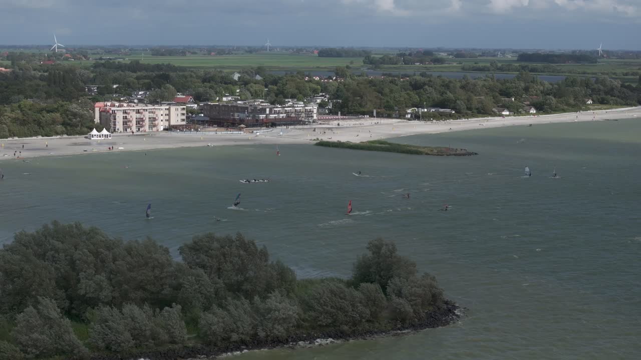 Wide view of Makkum beach windsurf spot during summer, aerial