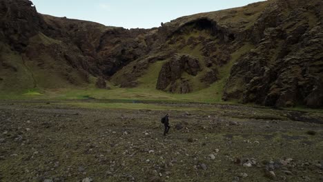 hiking through a stunning icelandic canyon