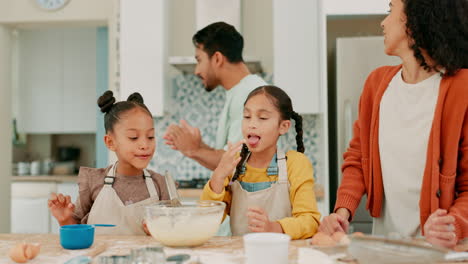 Laptop, problem solving and a family baking
