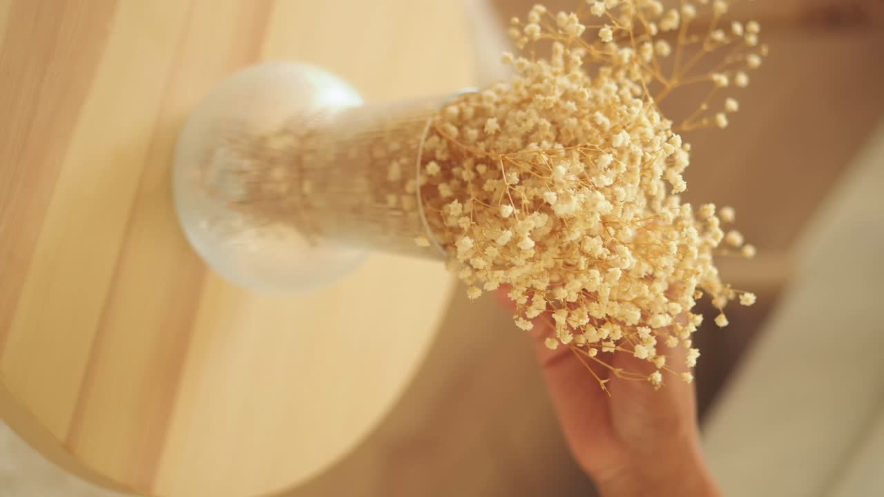 Dried Flowers in Vase on Table