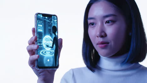 young asian woman engages with futuristic digital technology on her smartphone