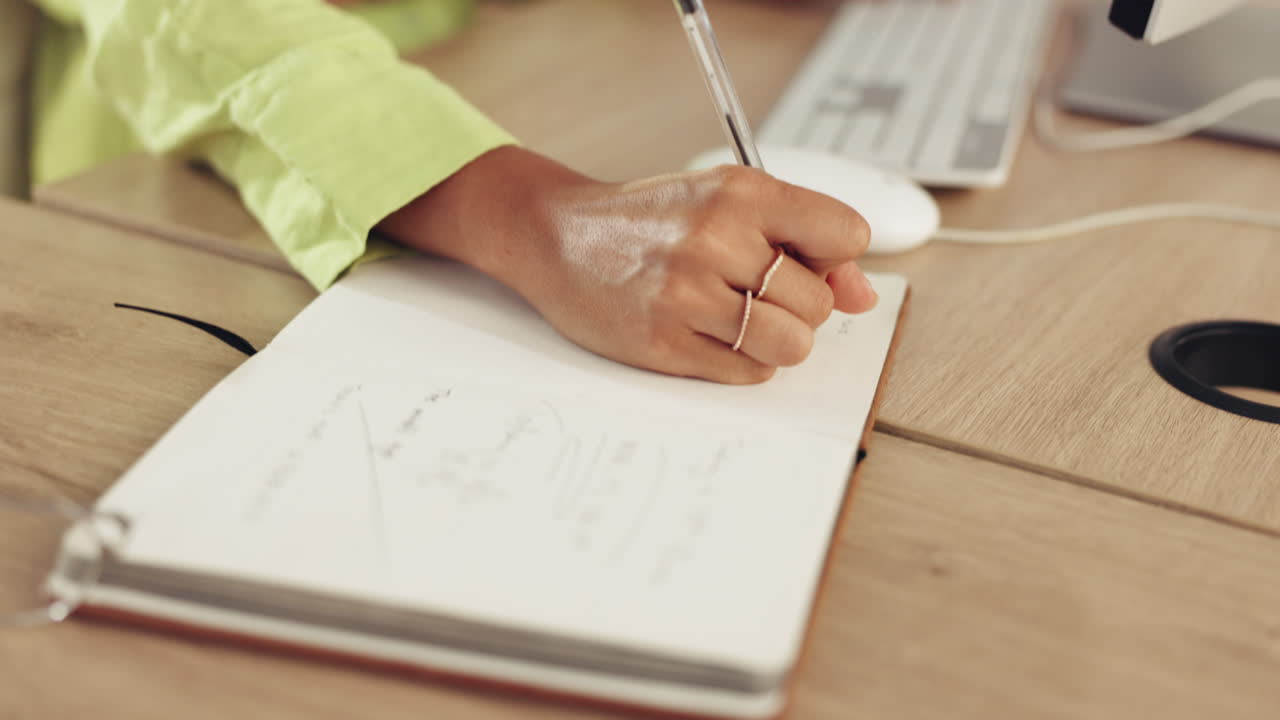 Hands, computer and woman writing notes