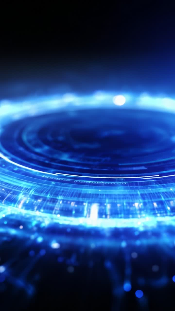 Et fascinerende sirkulært blått lysfenomen sender ut strålende energi, og skaper en visuelt imponerende fremstilling av teknologi og digital abstraksjon