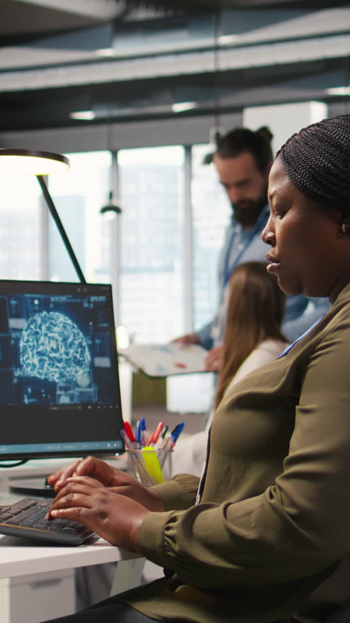 Vertical video Female technician writing code on PC, developing neural networks APIs