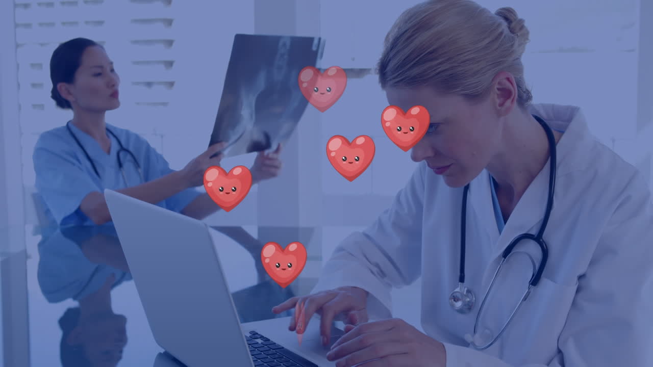 animación de iconos de corazones cayendo sobre dos doctores femeninos diversos