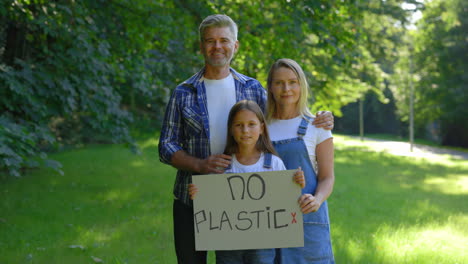 family protesting against plastic pollution