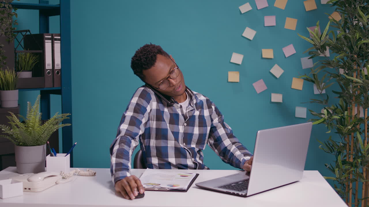 Business man using smartphone to talk on phone call