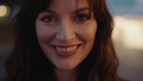 close-up-portrait-of-pretty-brunette-woman-smiling-happy-at-camera-lovely-sophisticated-smile