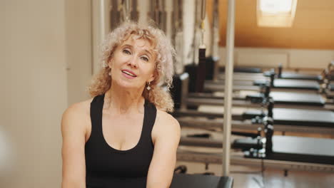 senior woman practicing pilates