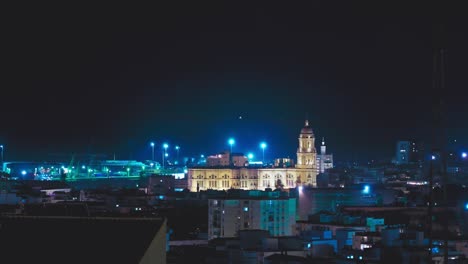 night view of malaga cathedral and surrounding buildings, spain