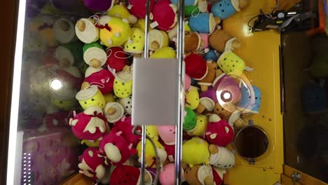 grabber machine with lovely dolls inside