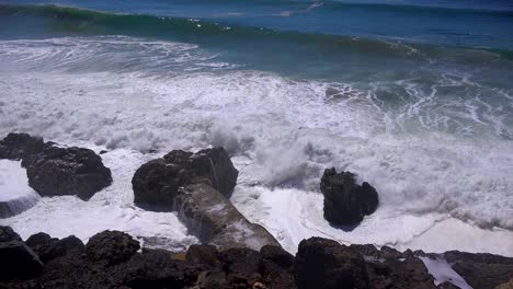 large waves crash along a southern california beach near malibu 2