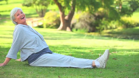 mature woman doing her stretches