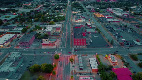 Aerial-dusk-view-of-busy-streets-and-buildings-in-Columbus,-Georgia