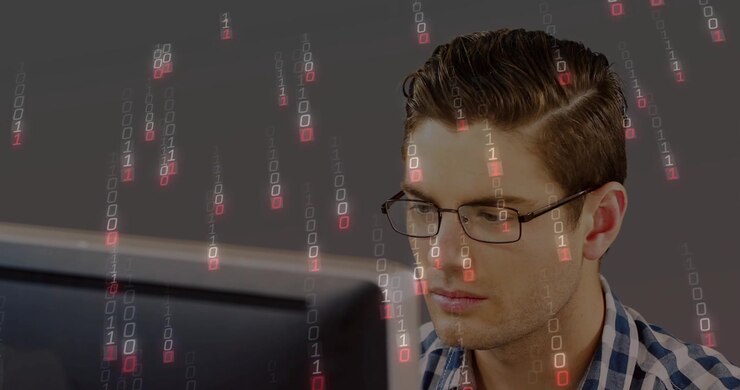 Man sitting focusing on screen, starting cascading binary symbols over glasses for tech analysis