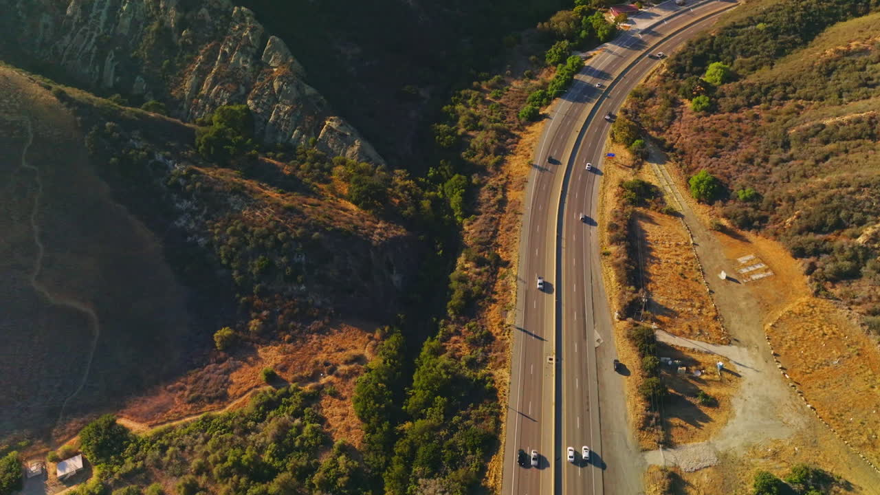 Highway Winding Through Mountain Valley