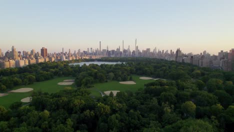 beautiful summer evening in central park, drone shot with sports fields and park space, nyc