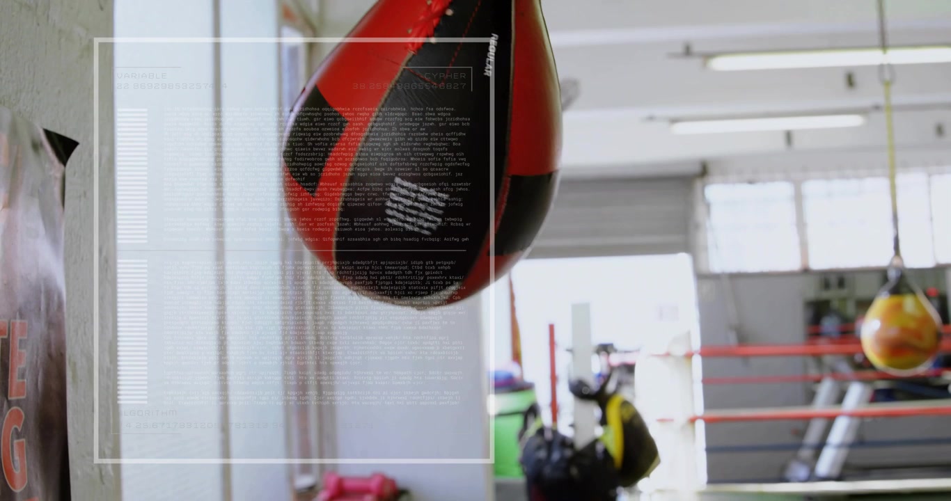 Boxare inleder ett slag mot en speedbag som orsakar rytmiska svängningar och demonstrerar en träningsrutin.