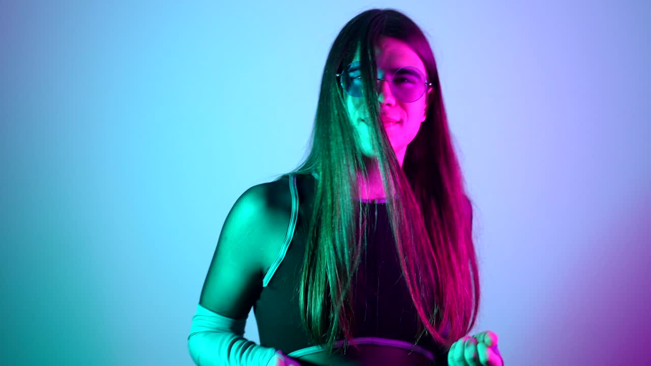 Woman in Neon Lighting with Sunglasses