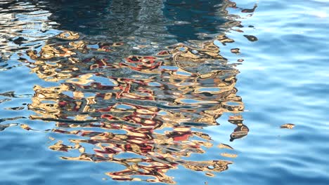 abstract reflection of a boat on water