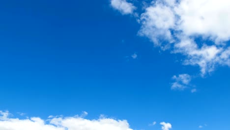 clouds are moving in the blue sky. timelapse