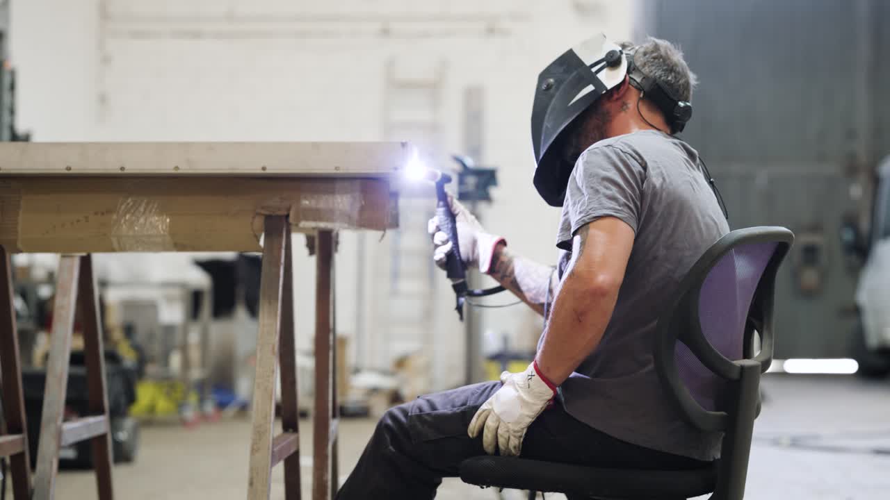 Welder working in a workshop