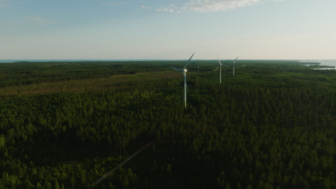 Wind turbines standing over the Hankoniemi wild, Sustainable energy in Finland