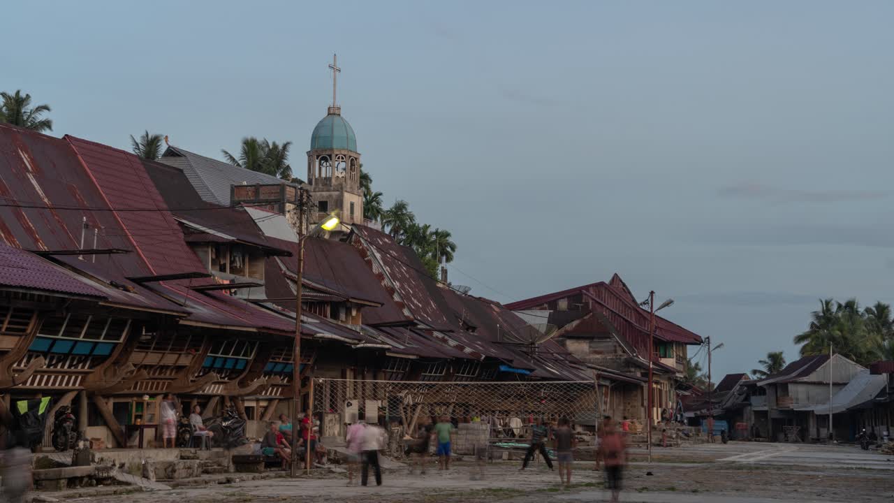 Dusk Volleyball Game in a Village with a Church
